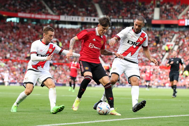 Alejandro Garnacho of Manchester United controls under pressure from Mario Saurez of Rayo Vallecano. Getty