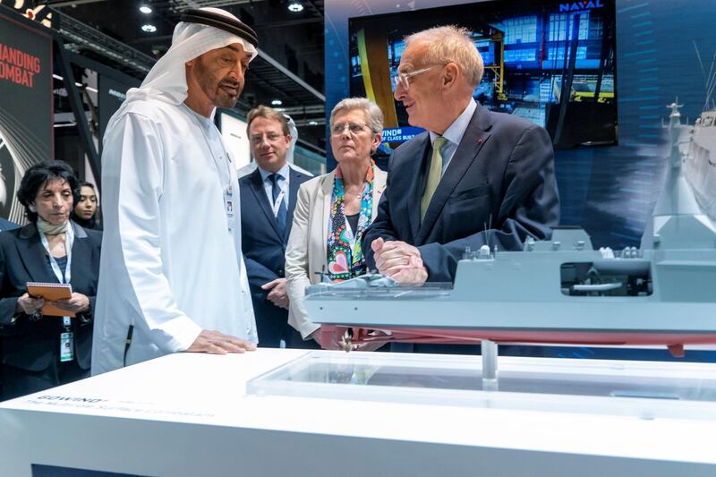 ABU DHABI, UNITED ARAB EMIRATES - February 17, 2019:  HH Sheikh Mohamed bin Zayed Al Nahyan, Crown Prince of Abu Dhabi and Deputy Supreme Commander of the UAE Armed Forces (L) visits NAVAL Group stand, during the 2019 International Defence Exhibition and Conference (IDEX), at Abu Dhabi National Exhibition Centre (ADNEC).

( Rashed Al Mansoori / Ministry of Presidential Affairs )
---