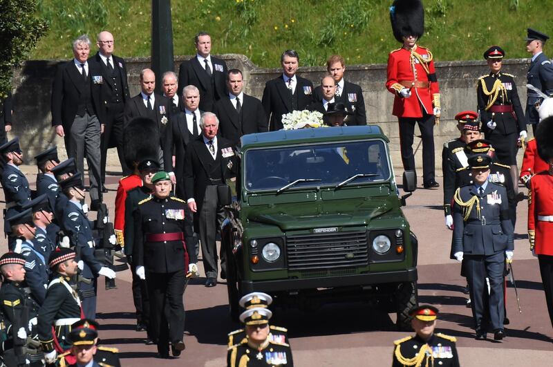 Members of the British royal family and military officials follow Prince Philip, the Duke of Edinburgh's coffin during his funeral at Windsor Castle, England. Getty