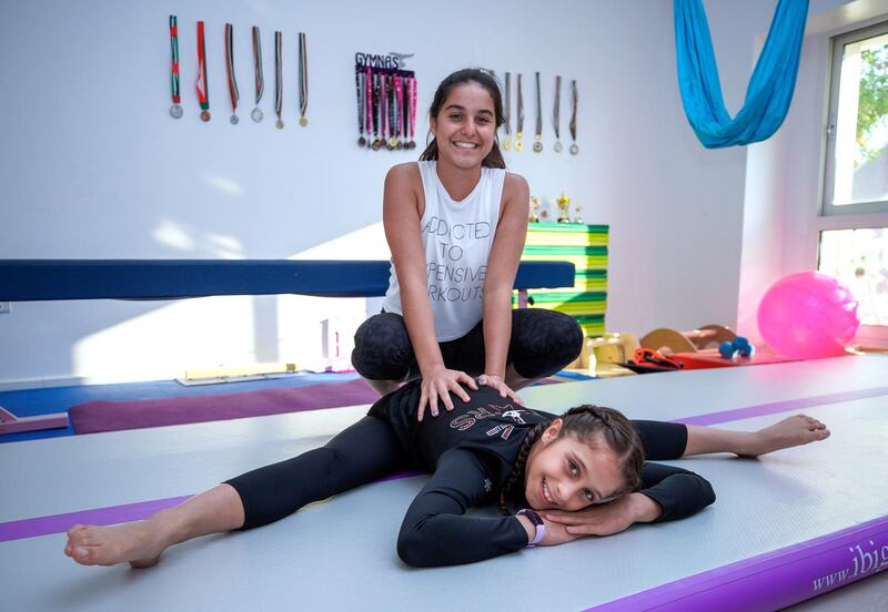 Abu Dhabi, United Arab Emirates, November 2, 2020.   Promising young gymnast,  Nosha El Bacha, 11, was on course for a bright future in the sport until the coronavirus pandemic brought her training to a  halt in March.   (R-L)) Nosha El Bacha, 11, and sister, Nour, 15.
Victor Besa/The National
Section:  NA
Reporter:  Nick Webster