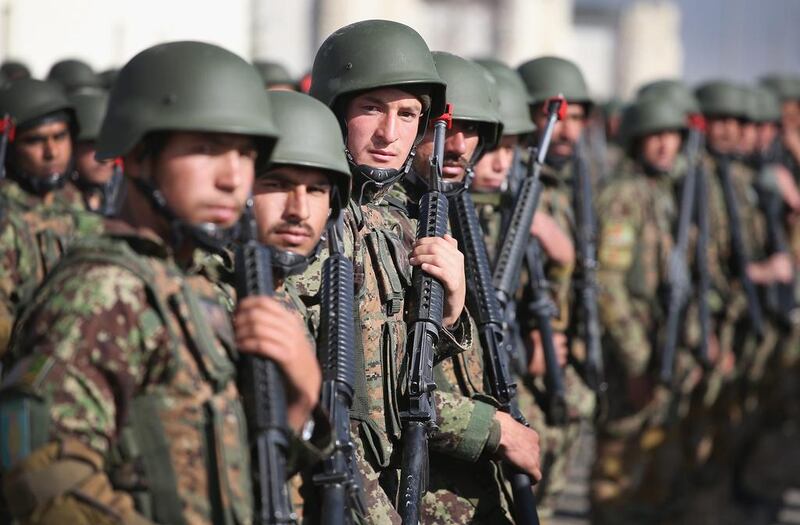 Soldiers with the Afghan National Army (ANA) during a graduation ceremony at the ANA’s combined fielding centre in Kabul. Scott Olson / Getty / March 18, 2014