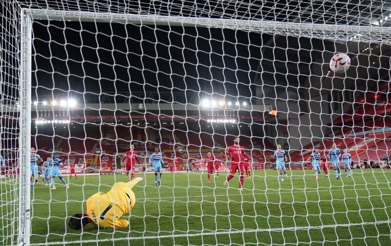 Mohamed Salah scores from the penalty spot to equalise for Liverpool against West Ham. Reuters