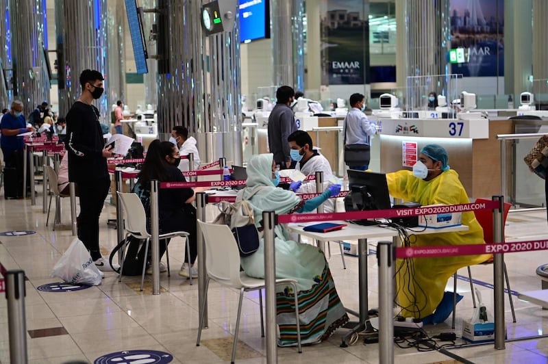 Tourists are asked to get tested in their home countries several days before they depart, but if unable to Dubai's health authority screens them for free. AFP