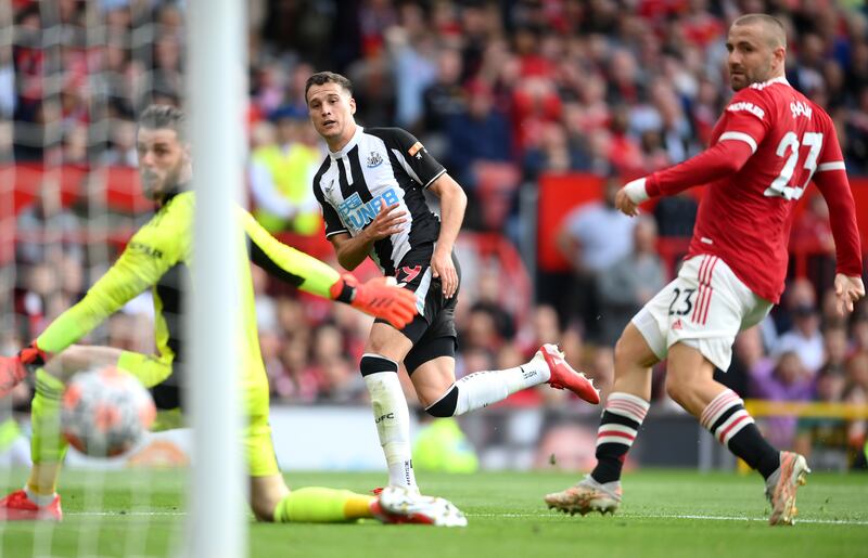 Javier Manquillo scores for Newcastle against Manchester United. Getty