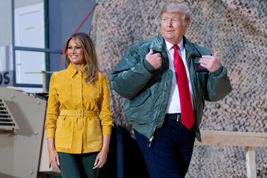 US President Donald Trump and First Lady Melania Trump arrive on an unannounced trip to Al Asad Air Base in Iraq on December 26, 2018. AFP