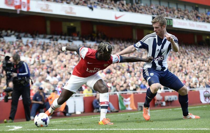Right-back: Bacary Sagna, Arsenal. Showed why Arsenal will miss him if he goes with an energetic performance against West Bromwich Albion. Facundo Arrizabalaga / EPA