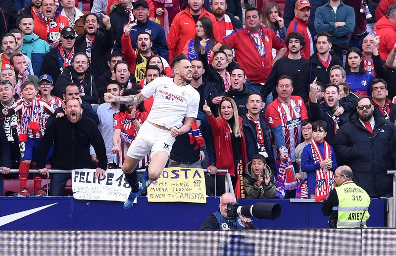 MADRID, SPAIN - MARCH 07: Lucas Ocampos of Sevilla FC celebrates after scoring his team's second goal during the Liga match between Club Atletico de Madrid and Sevilla FC at Wanda Metropolitano on March 07, 2020 in Madrid, Spain. (Photo by Denis Doyle/Getty Images)