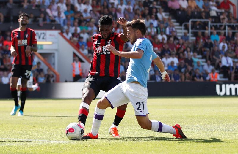 Bournemouth's Jefferson Lerma in action with Manchester City's David Silva. Reuters