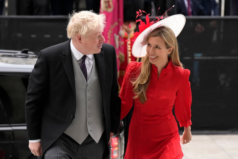 British Prime Minister Boris Johnson and his wife Carrie arrive for the service of thanksgiving. AP