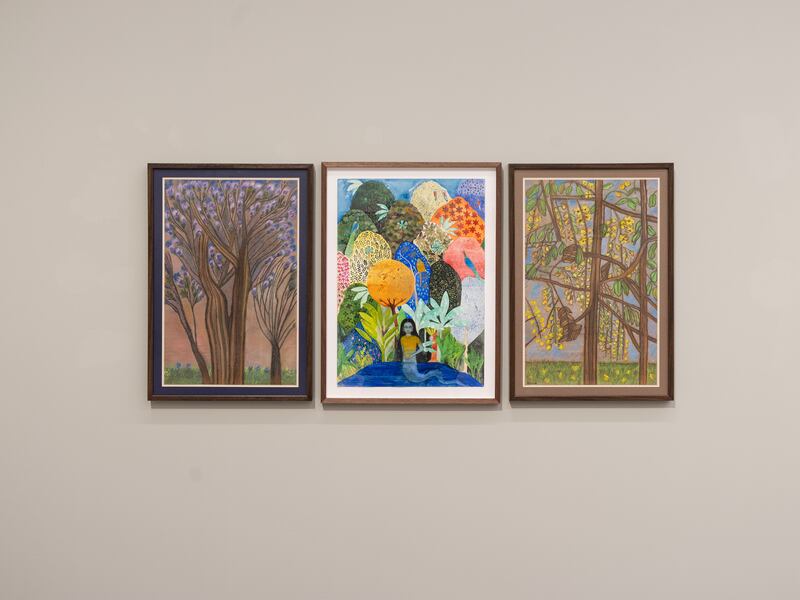 A work by Emily Avery Yoshiko Crow (centre) contrasted with paintings by Vinnie Gill