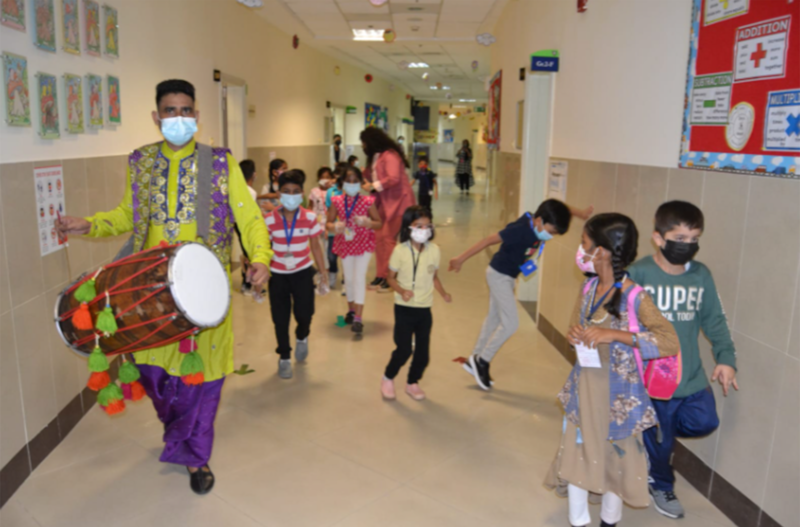 At The Indian International School, pupils and teachers danced to the beat of the dhol, a traditional Indian musical instrument, to welcome everyone.