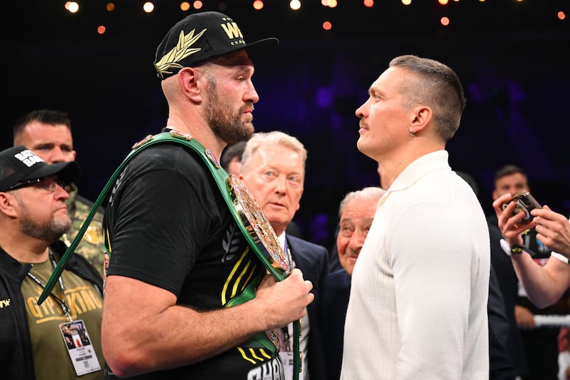 Tyson Fury and Oleksandr Usyk face off in the ring after Fury's win over Francis Ngannou. Getty