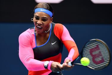 Serena Williams hits a return against Laura Siegemund during her first-round match at the Australian Open. AFP