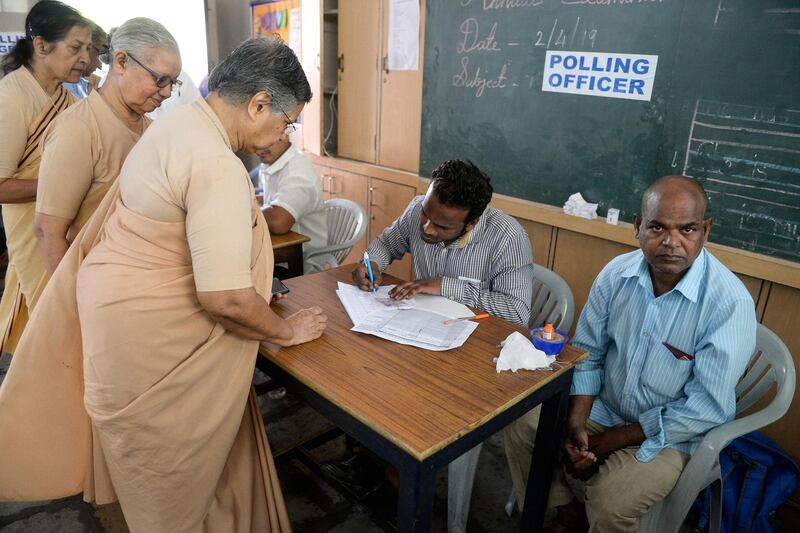 People register to vote in Hyderabad. AFP