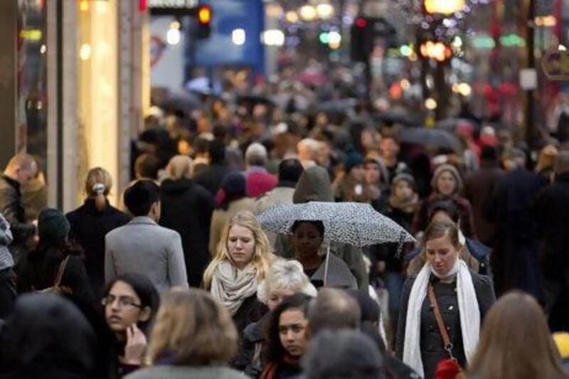 Shoppers on London's Oxford Street. The indicators are of weak consumer spending in the build-up to the Christmas shopping season. Leon Neal / AFP