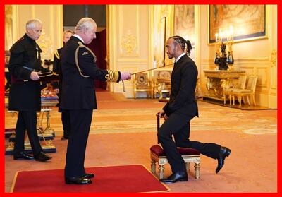 Sir Lewis Hamilton is made a knight by the Prince of Wales at Windsor Castle. PA