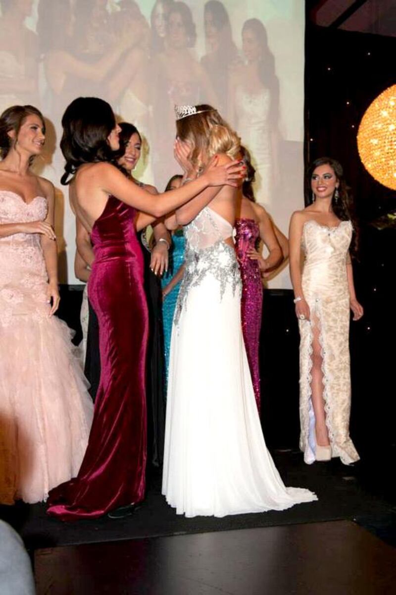 Cynthia Farah receiving the news of her win. Courtesy Miss Lebanon Australia 2014