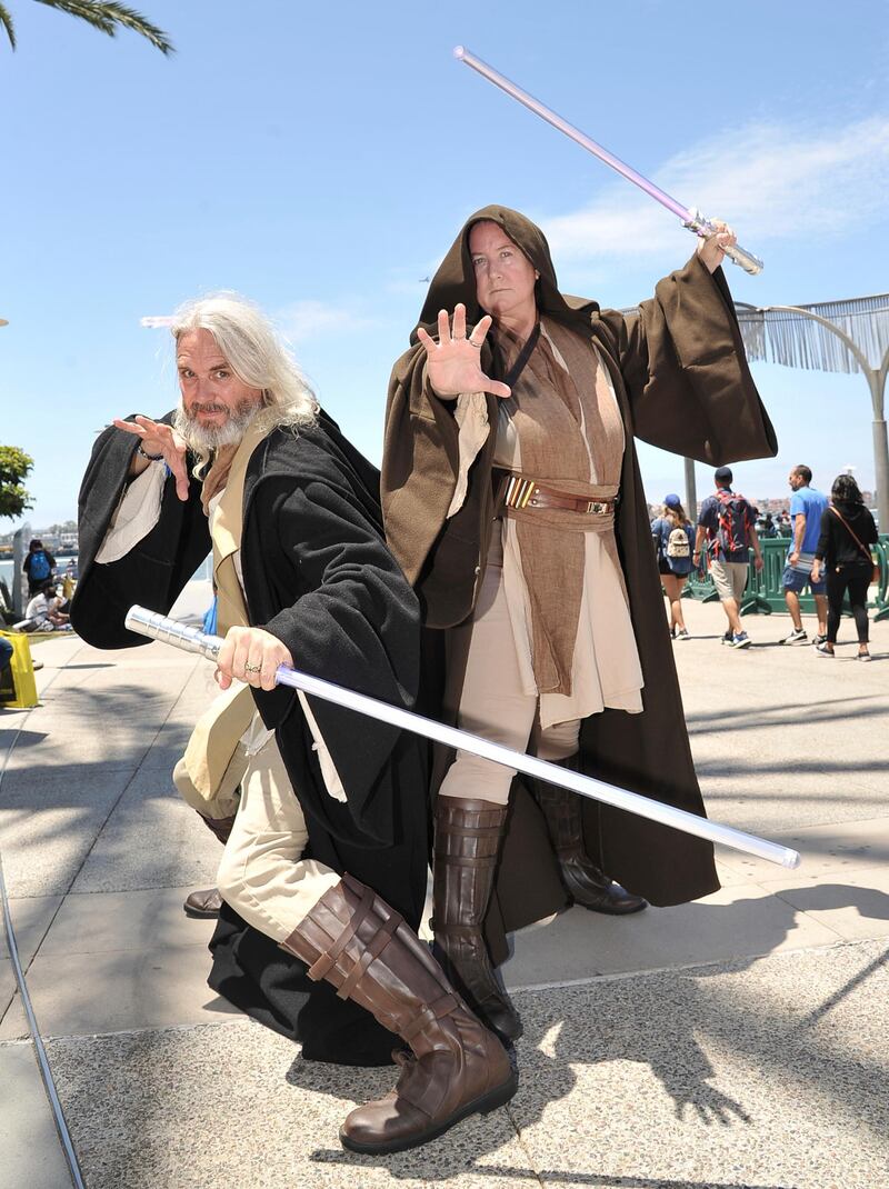 Paul Primose, left, and Joyce Primose, of San Diego, are dressed as characters from "Star Wars." AP Photo