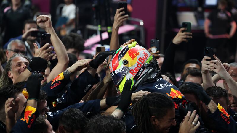 Sergio Perez and Red Bull Racing celebrate in parc ferme. Getty