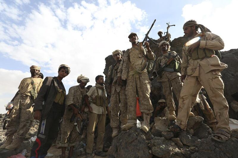 Soldiers loyal to Yemen’s government assemble at a battle zone with Houthi rebels in Marib on Sunday. The offensive was launched nine days after a Houthi missile attack on a coalition camp in Marib killed 52 soldiers from the UAE, 10 from Saudi Arabia and five from Bahrain, and two days after rebel rockets killed at least 20 civilians at a market in Marib city. REUTERS