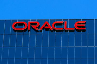 FILE PHOTO: The Oracle logo is shown on an office building in Irvine, California, U.S. June 28, 2018. REUTERS/Mike Blake/File Photo
