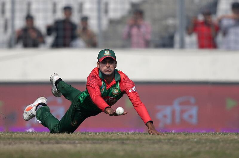 Bangladesh's Mehidy Hasan Miraz dives to catch the ball unsuccessfully as he fields against Sri Lanka during the final match of the Tri-Nation one-day international cricket series in Dhaka, Bangladesh. AM Ahad / AP Photo