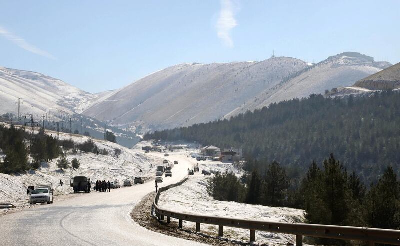 A view of a snow covered road in Suleimaniyah in Iraq's northern Kurdistan region on January 10, 2019. (Photo by Shwan MOHAMMED / AFP)