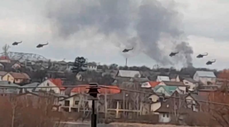 Russian military helicopters fly over the Ukrainian capital. AP