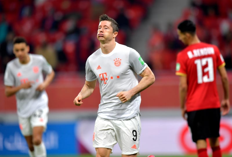 Robert Lewandowski celebrates after his second goal. EPA