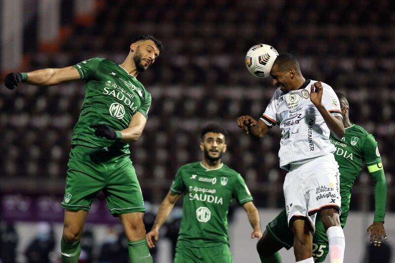Al Shabab’s Abdullah Al Zoari, with ball, in action against Al Ahli’s Omar Al Somah, left, during a Saudi Professional League football match at Prince Khalid bin Sultan Stadium, in Riyadh, Saudi Arabia. EPA