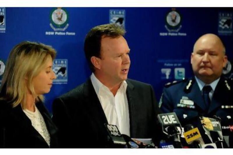 Bill Pulver, centre, spoke about his daughter's ordeal at a press conference in Sydney yesterday. Greg Wood/ AFP