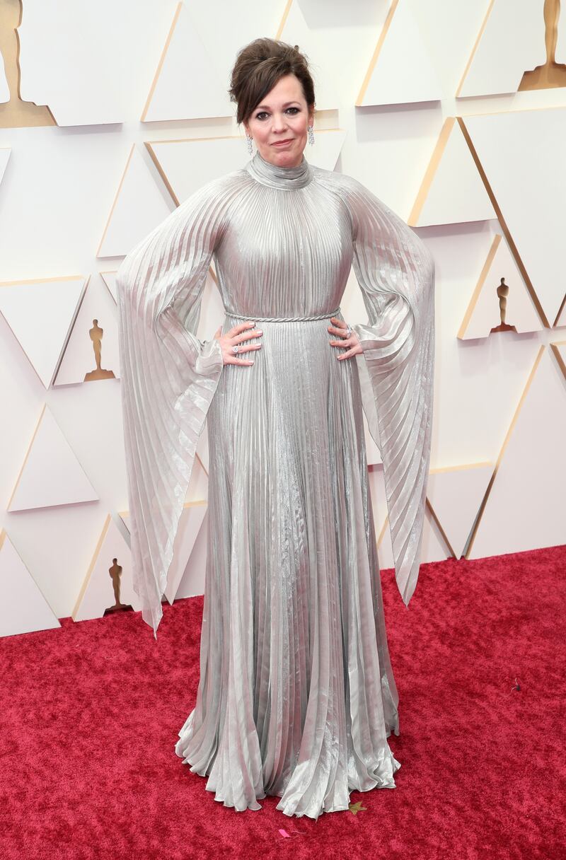 Olivia Colman wore silver to the Oscars 2022. AFP

