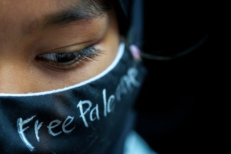 A participant in a pro-Palestine rally in front of the Israeli embassy in Bangkok, Thailand, on October 21, 2023. Reuters