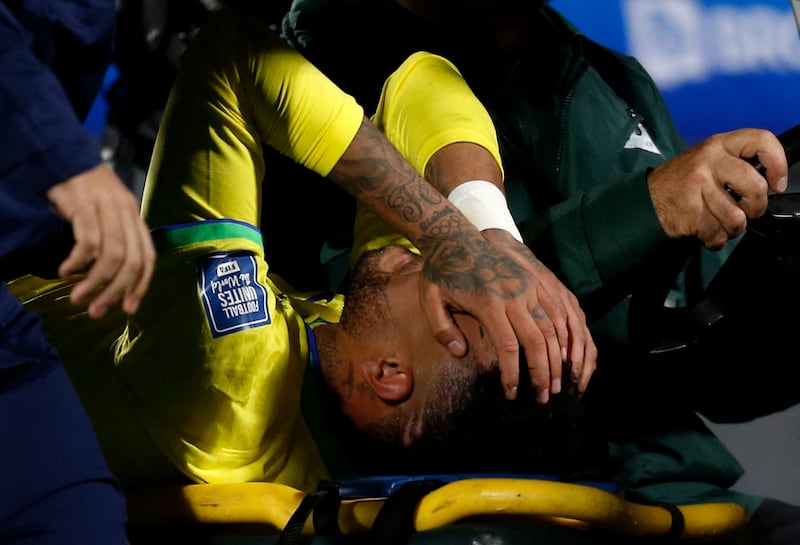 Neymar is stretchered off the field during Brazil's game against Uruguay. Reuters