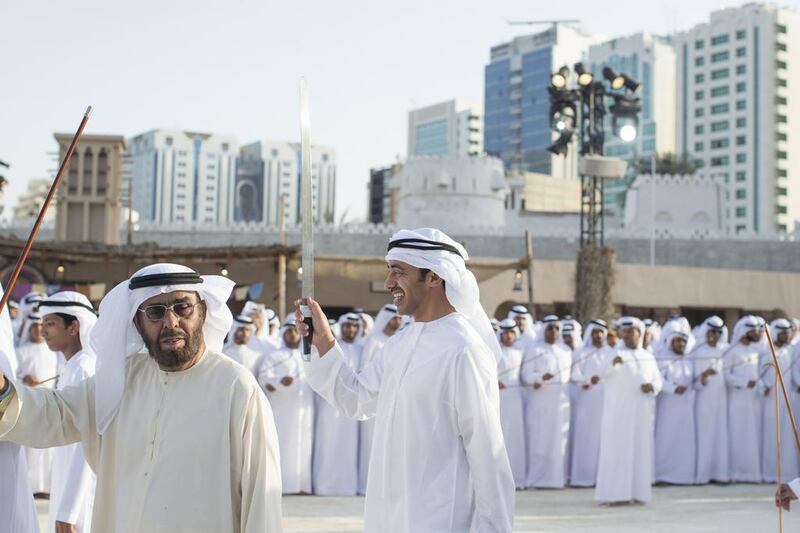 Sheikh Abdullah bin Zayed Al Nahyan Minister of Foreign Affairs (C), dances inside the grounds of Qasr Al Hosn fort on the opening day of the Qasr Al Hosn Festival 2015. Ryan Carter / Crown Prince Court - Abu Dhabi 