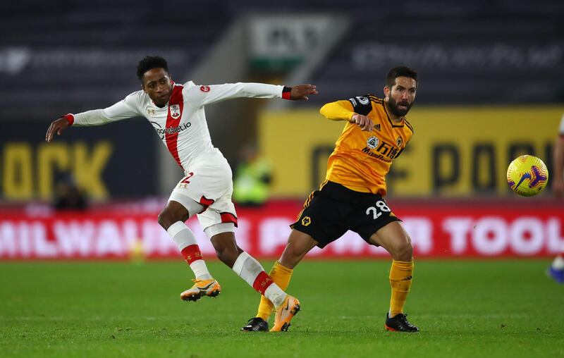 Southampton's Kyle Walker-Peters (left) and Wolverhampton Wanderers' Joao Moutinho battle for the ball. PA