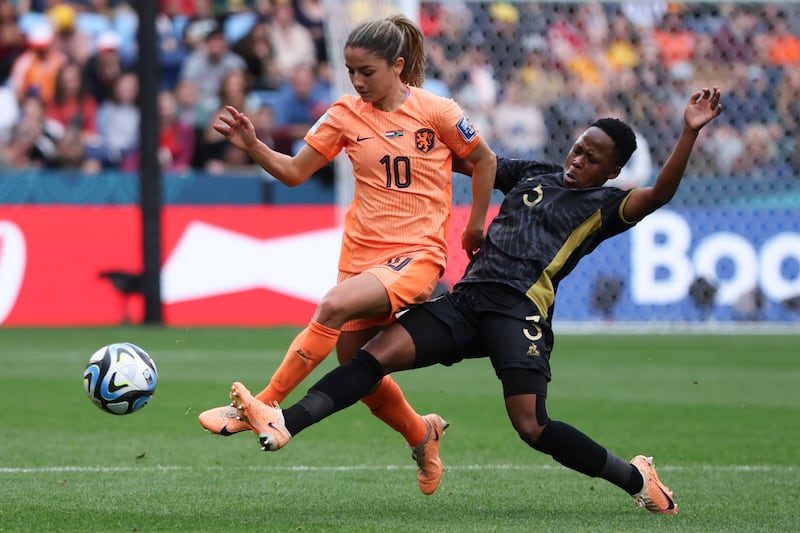 Netherlands' Danielle Van de Donk, left, competes for the ball with South Africa's Bongeka Gamede during the Women's World Cup Group round of 16 soccer match between Netherlands and South Africa in Sydney, Australia, on August 6. AP