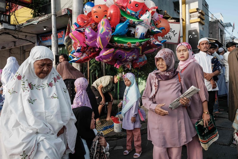 Muslim worshippers gather for prayers on the first day of Eid Al Fitr prayers in Jakarta. AFP