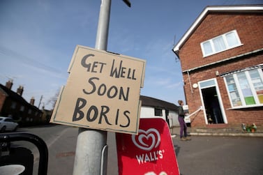 A sign of support for British Prime Minister Boris Johnson, who is in hospital with coronavirus. REUTERS/Carl Recine
