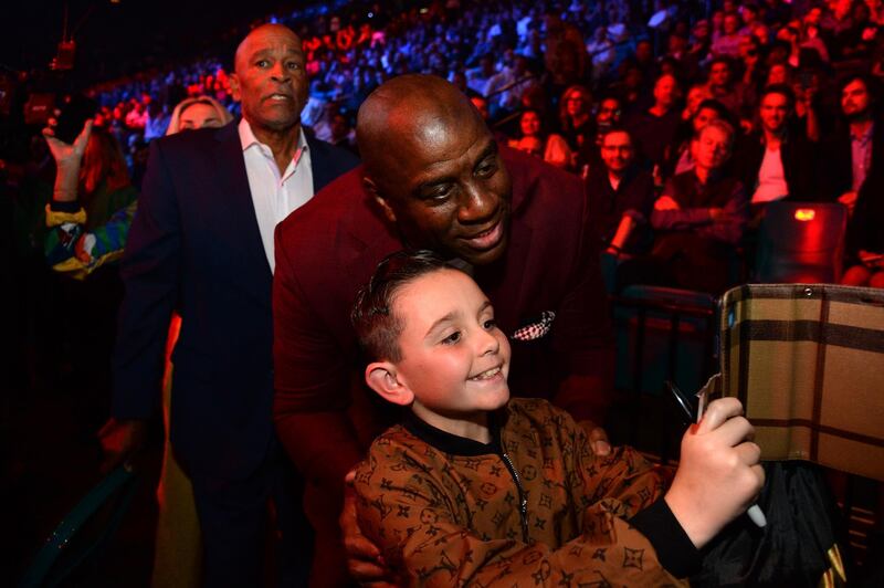 NBA Hall of Fame member Magic Johnson attends the WBC heavyweight title bout between Deontay Wilder and Tyson Fury at MGM Grand Garden Arena.