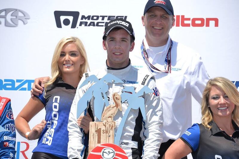 Ed Jones poses with the first-place trophy on top of the podium on Sunday, March 28. Photo courtesy: Road to Indy