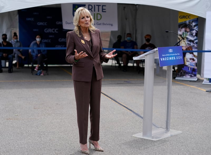 Jill Biden, in a coordinated brown suit, speaks in Grand Rapids, Michigan on May 27, 2021. AFP