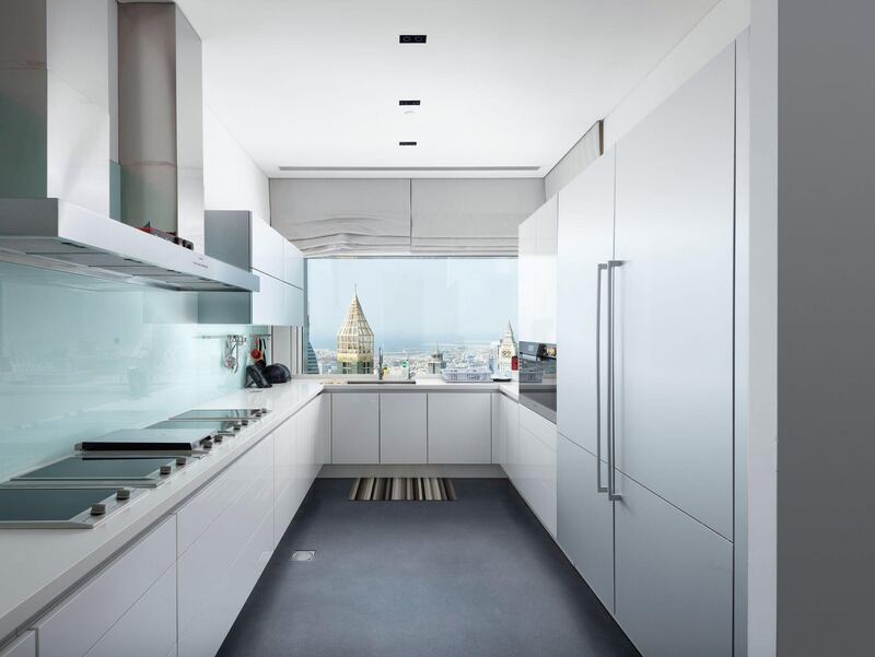 Sleek finishings in the modern kitchen. Courtesy Luxhabitat Sotheby's International Realty