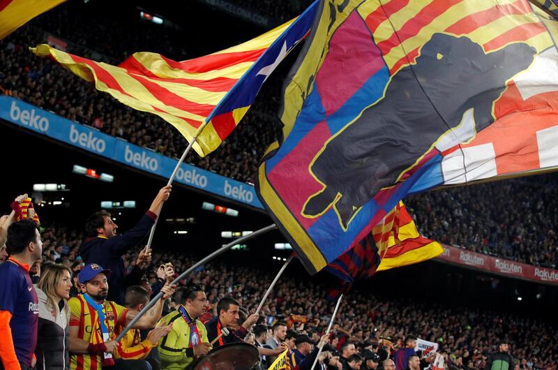 Fans inside the stadium during the match. Reuters