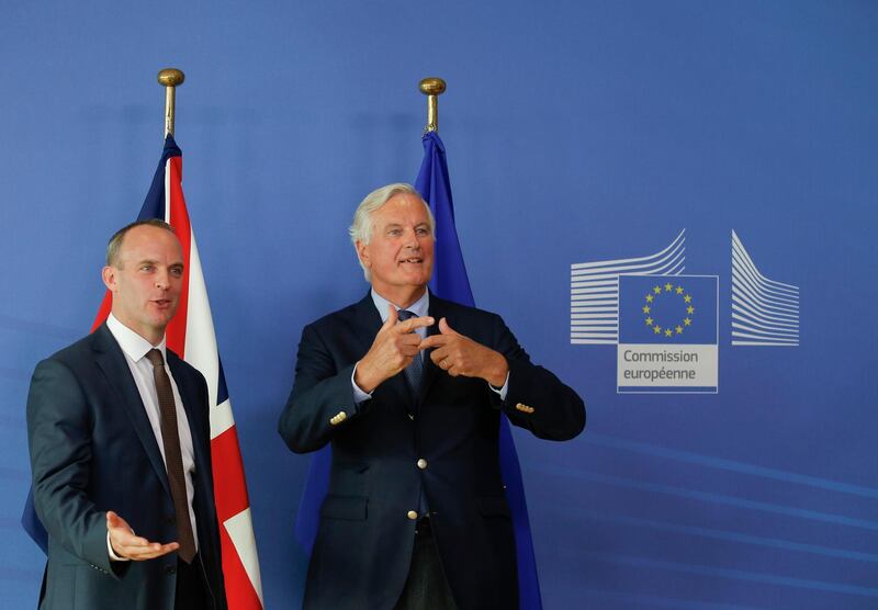 epaselect epa06962812 British Government Brexit secretary Dominic Raab (L) and EU's chief Brexit negotiator Michel Barnier give a press conference at theend of a round of talks in Brexit negotiations at the European Commission in Brussels, Belgium, 21 August 2018.  EPA/OLIVIER HOSLET