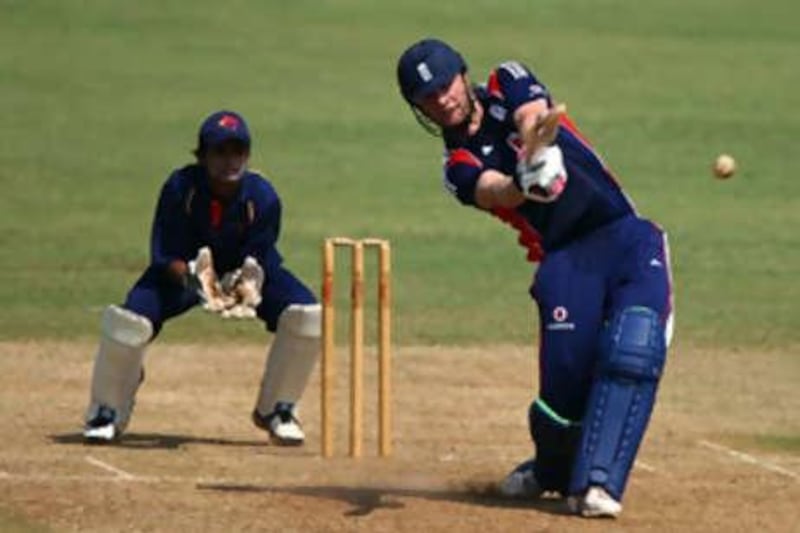 The England batsman Andrew Flintoff attempts another big hit on his way to his first century in over three years.