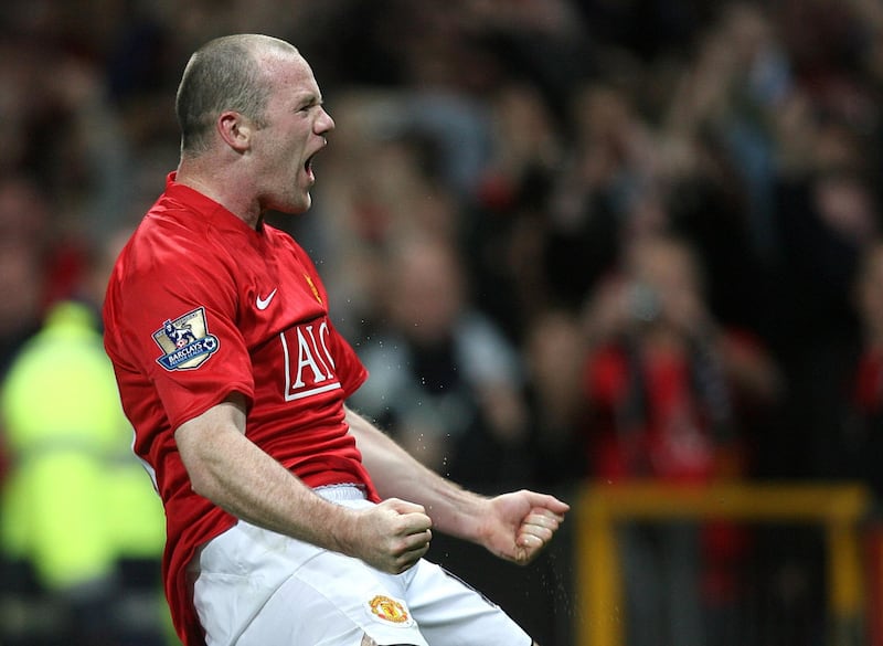 Manchester United's Wayne Rooney celebrates after scoring during a Premier League match on October 18, 2008. PA