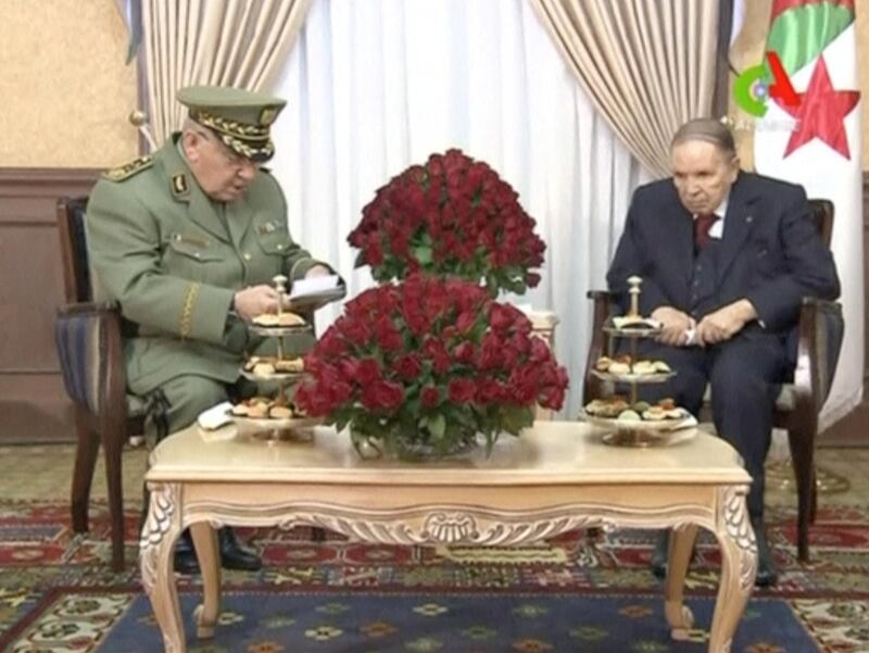 Algeria's President Abdelaziz Bouteflika meets with army Chief of Staff Lieutenant General Gaid Salah in Algiers, Algeria, in this handout still image taken from a TV footage released on March 11, 2019.  Algerian TV /Handout via Reuters  ATTENTION EDITORS - THIS IMAGE WAS PROVIDED BY A THIRD PARTY NO RESALES. NO ARCHIVE.  NO ACCESS ALGERIA