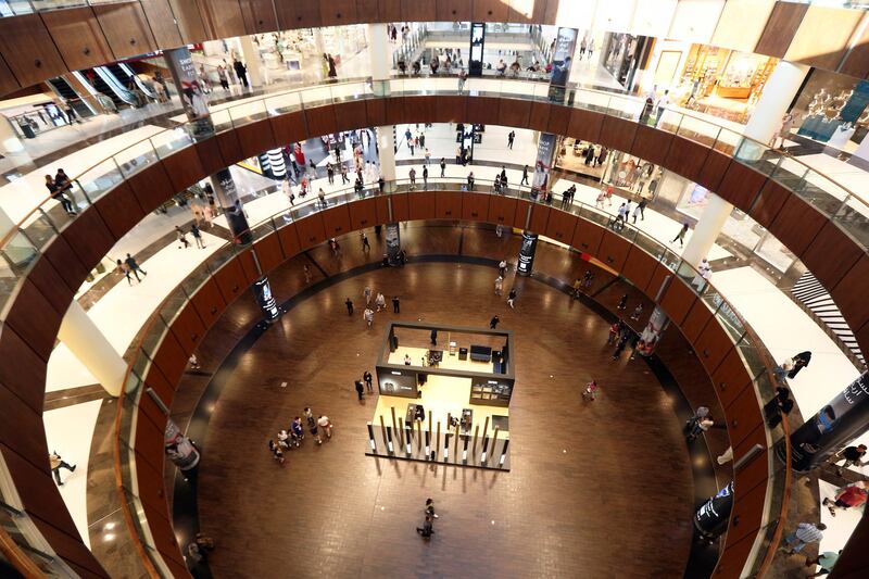People shop at The Dubai Mall, in Dubai, United Arab Emirates March 12, 2020. Picture taken March 12, 2020. REUTERS/Satish Kumar