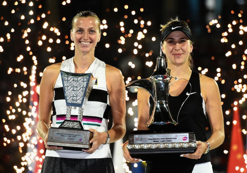 Bencic and Kvitova pose with their respective trophies. Getty